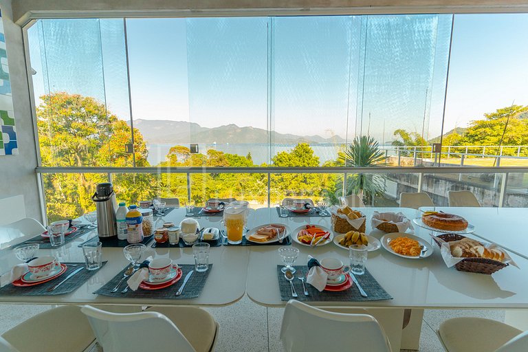 Mansão Orla Portogalo – Luxo à Beira-Mar em Angra