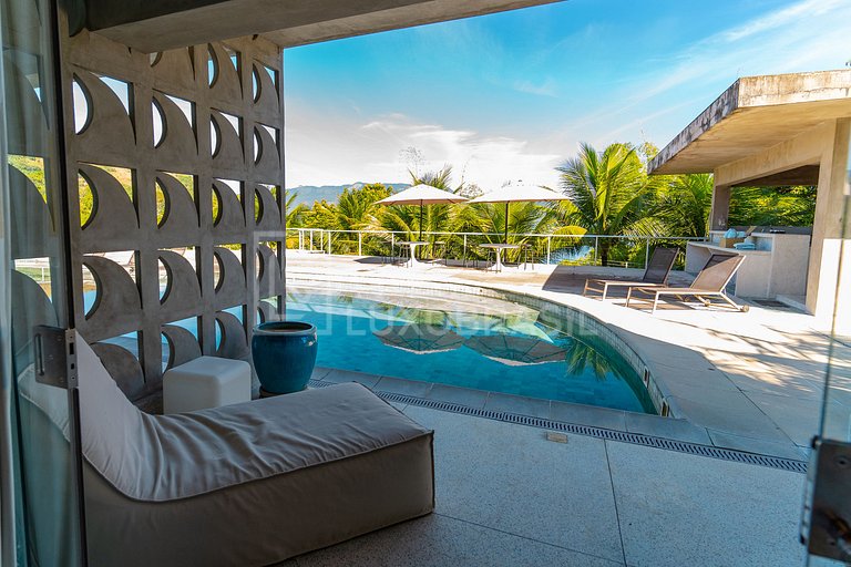 Mansão Orla Portogalo – Luxo à Beira-Mar em Angra