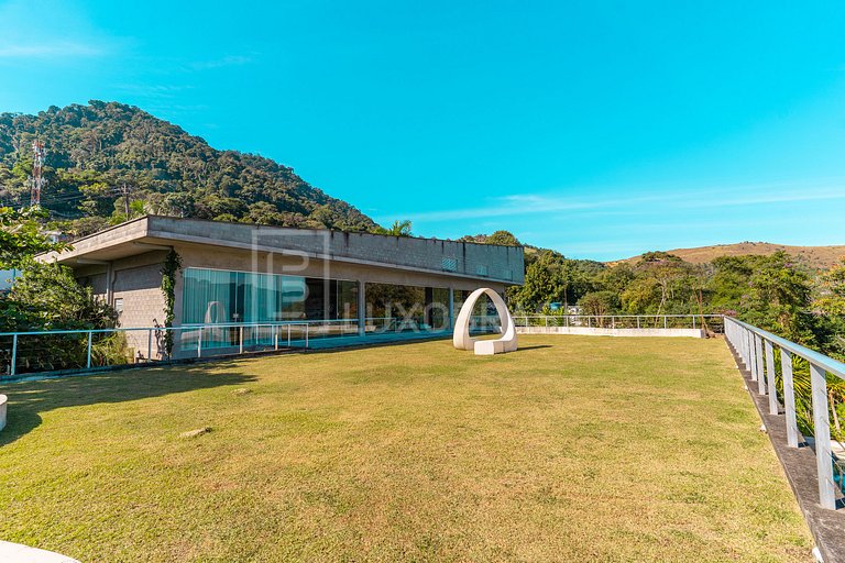 Mansão Orla Portogalo – Luxo à Beira-Mar em Angra
